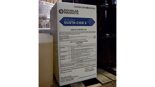 Box of Douglas Products DUST-A-CIDE 6 on a wooden pallet with a white background