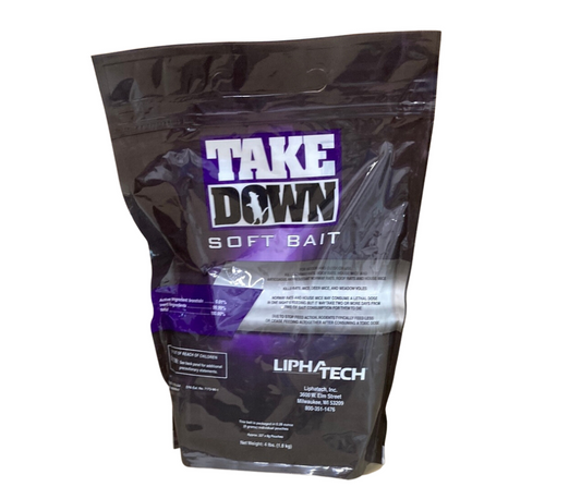 A black and purple pouch labeled 'TakeDown Soft Bait' by Liphatech, which is a professional rodenticide bait designed to attract and kill rats and mice.