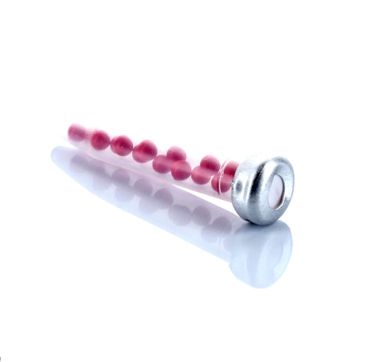 A pheromone bullet lure designed for capturing Red Flour Beetles and Confused Flour Beetles, featuring a series of pink segments attached to a metal shaft.