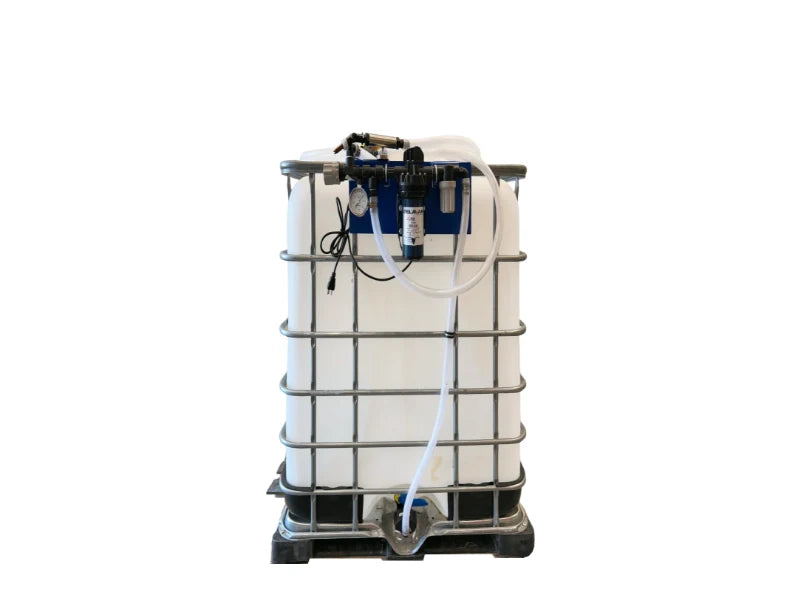 IBC tote with a pump, pressure gauge and hoses mounted on the cage